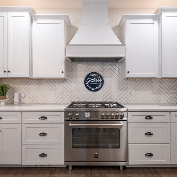 closeup shot of a white kitchen furniture with gas